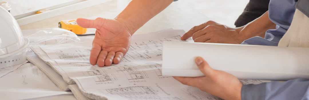 architect with blueprints